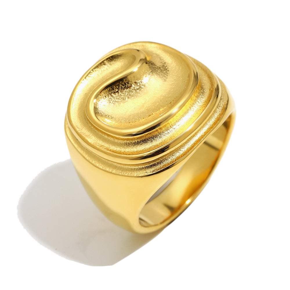 close front view of gold plated concentric ripple signet ring