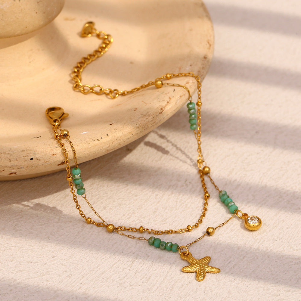 Gold Plated Stainless Steel Green Bead Starfish Double-Strand Bracelet — starfish charm close-up