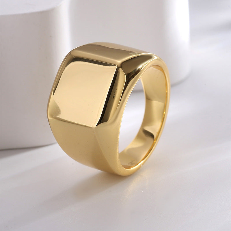 angled square signet ring showing polished face and tapered shoulders