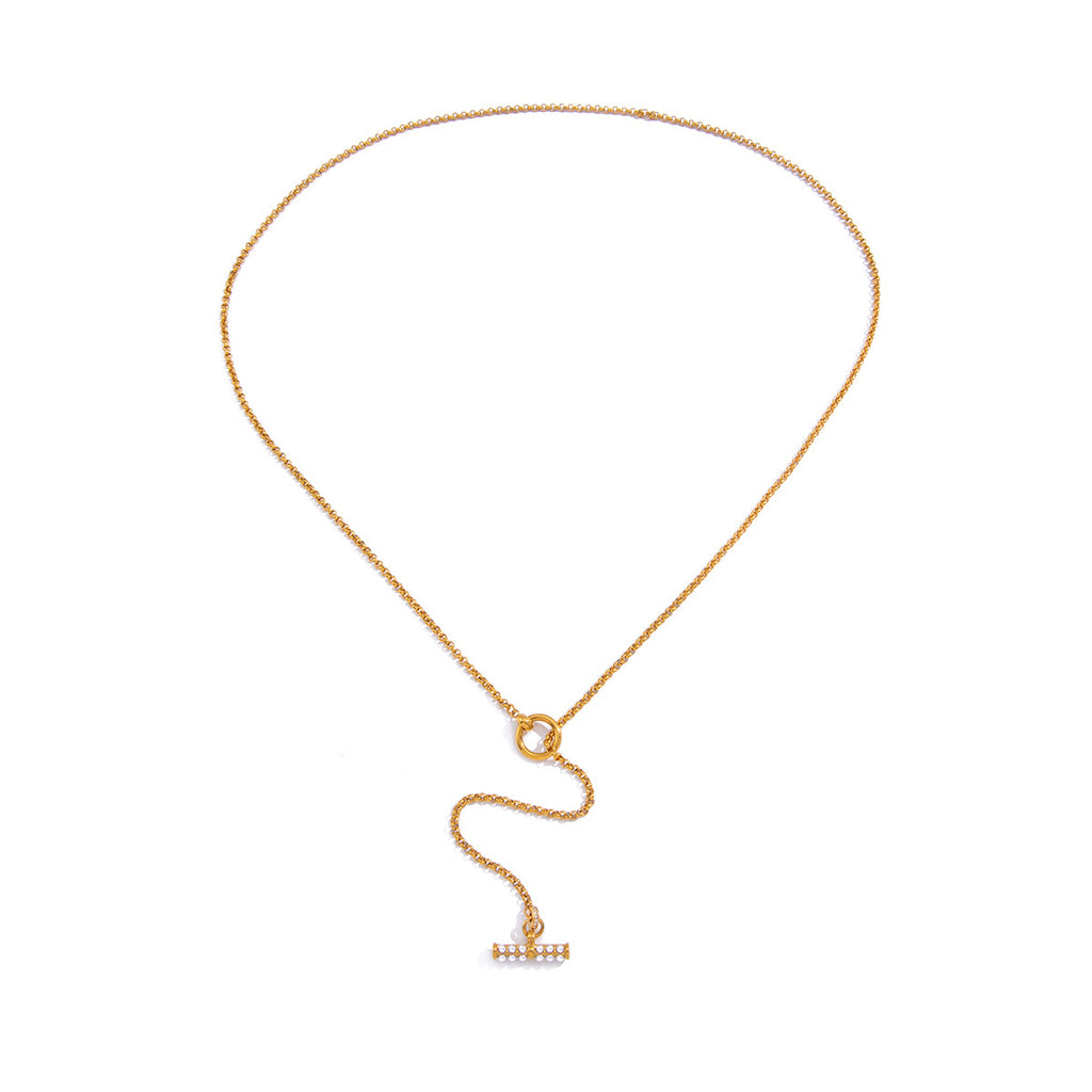 Fine chain lariat laid on white