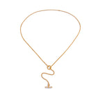 Fine chain lariat laid on white