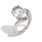 isolated silver-finish stainless steel oval clear-stone ring