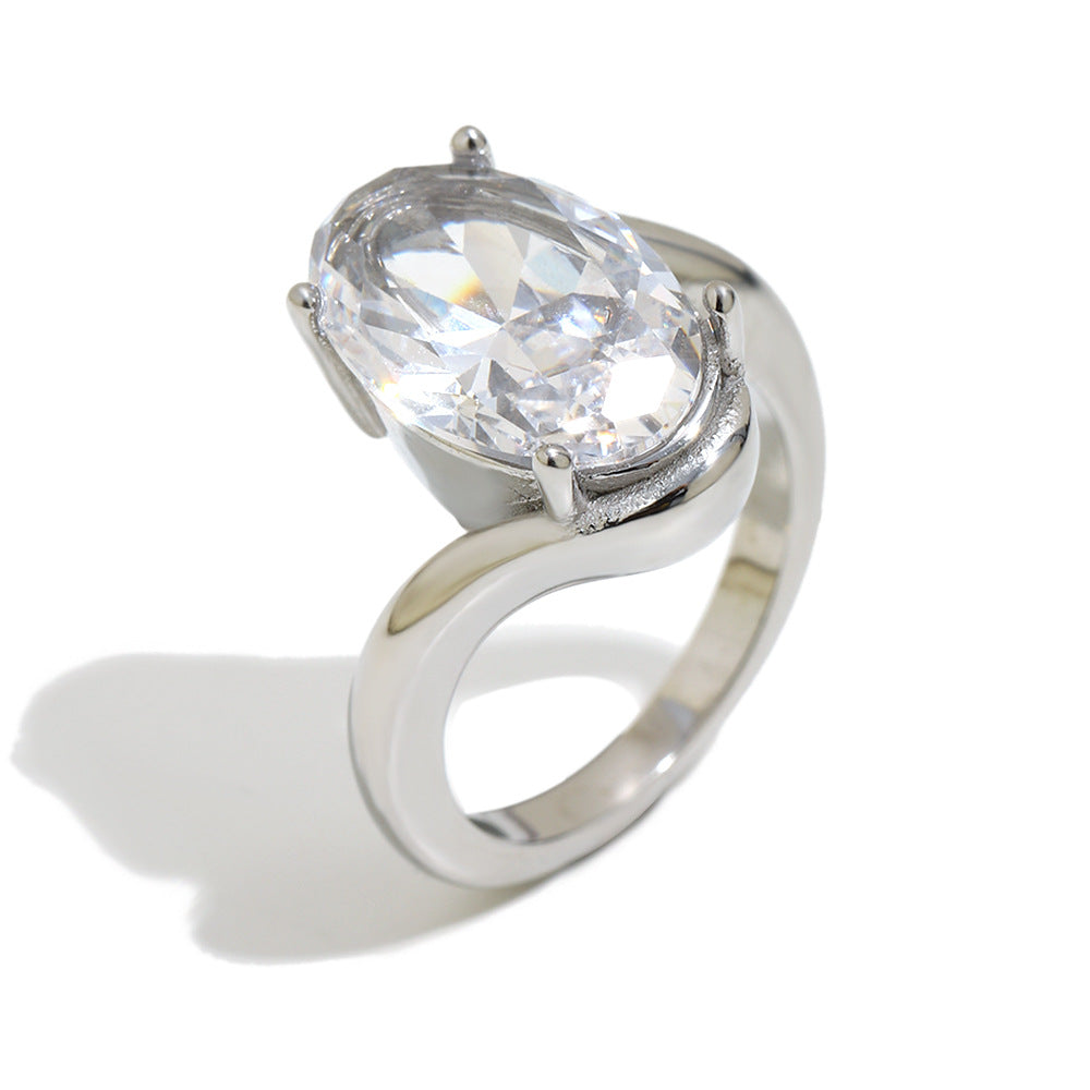 isolated silver-finish stainless steel oval clear-stone ring