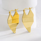 gold plated brass folded geometric drop earrings in studio view