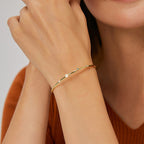 model wearing the slim zirconia and white cabochon cuff