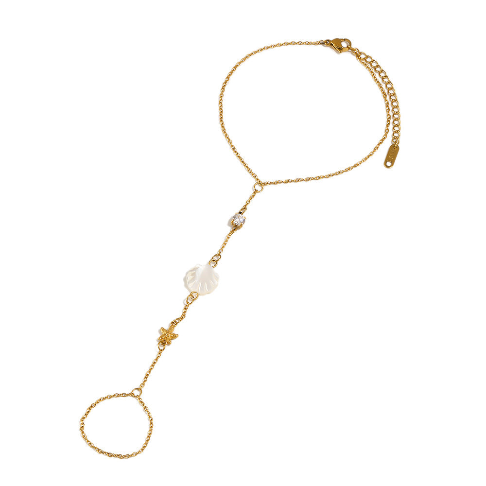 Front view of the gold-tone stainless steel foot-chain anklet