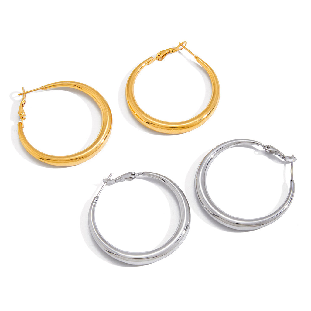two sizes of graduated stainless steel hoops in gold plated and silver finish