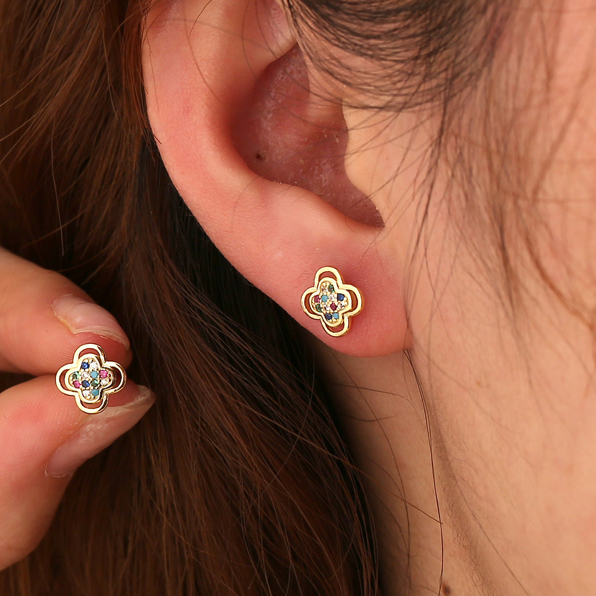 model wearing petite multicolor clover stud earrings