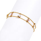 Two parallel chains linked by assorted stone shapes