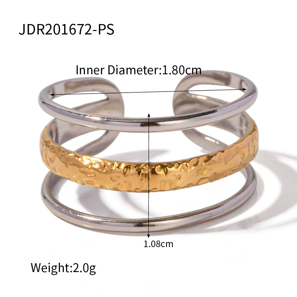Two-Tone Sculptural Stainless Steel Ring Collection — selectable styles and material reference
