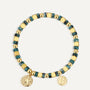 gold plated starfish medallion bracelet with mottled turquoise-color beads