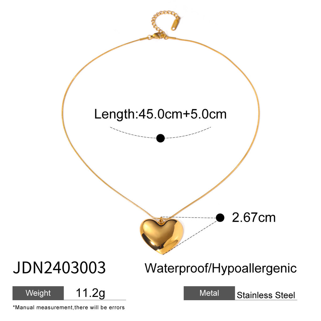 Gold-tone heart necklace with pendant and chain measurements