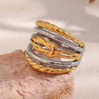 two-tone stainless steel layered rope statement ring on stone