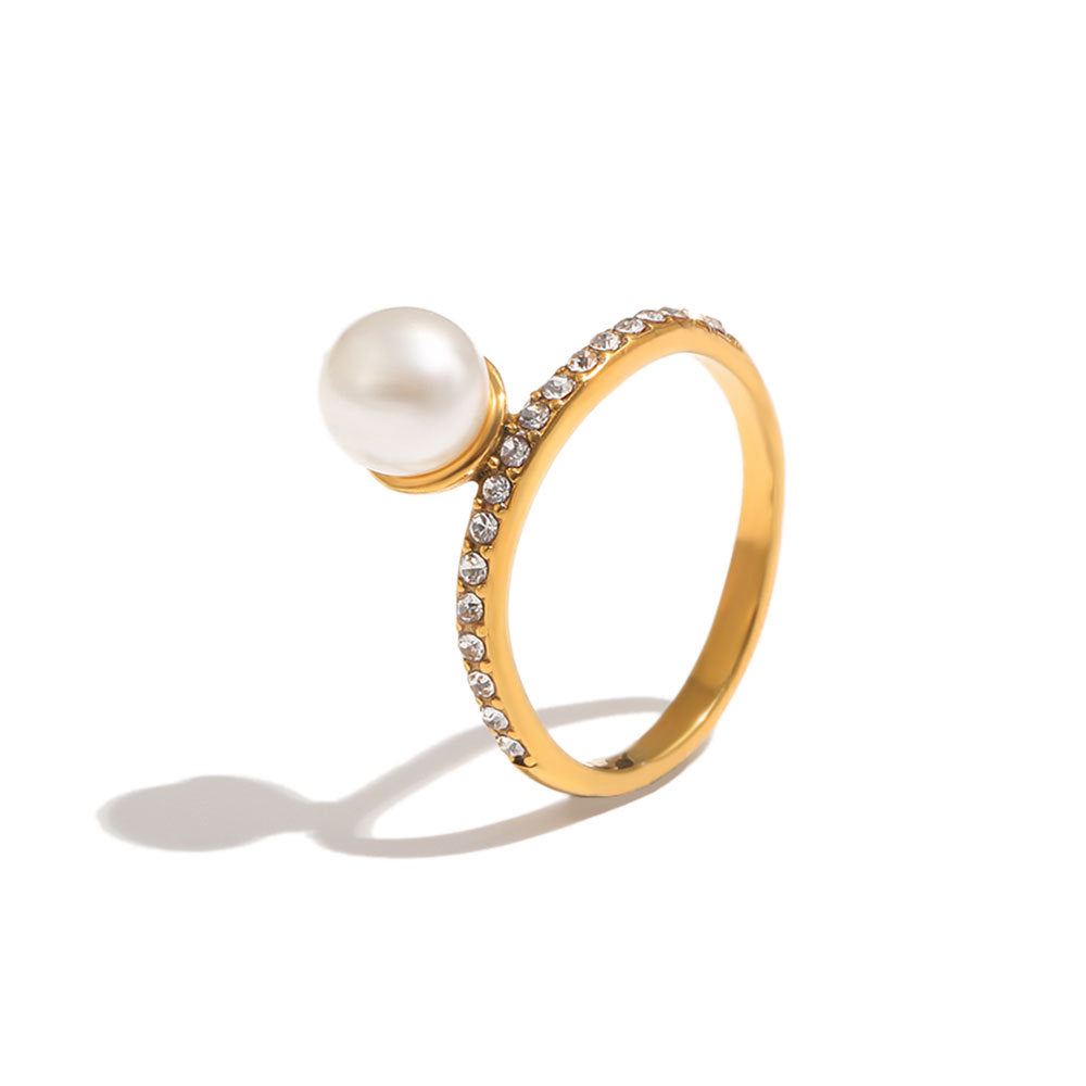 Angled front view of pearl-look bead and narrow stone band