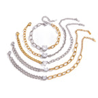 Five two-tone bracelets on white