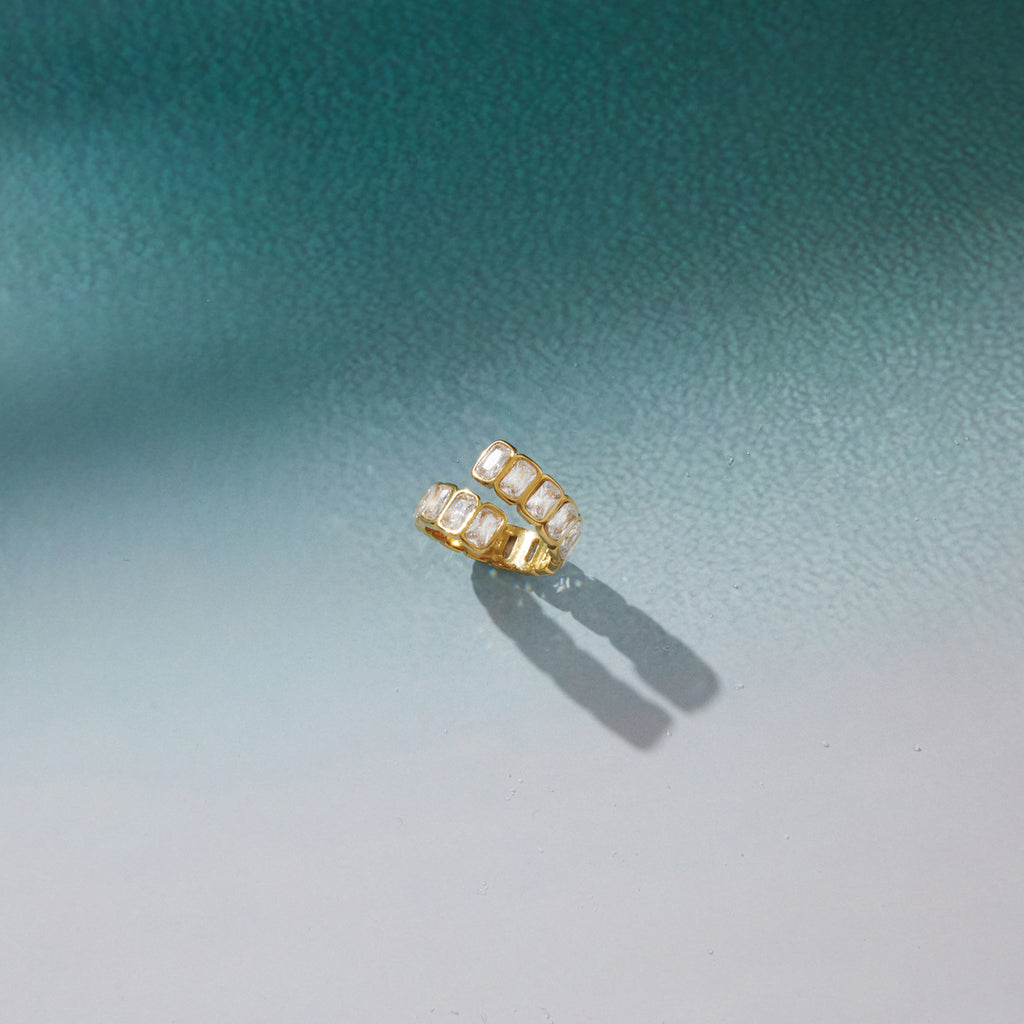Bypass ring casting a shadow on a green surface