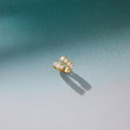 Bypass ring casting a shadow on a green surface