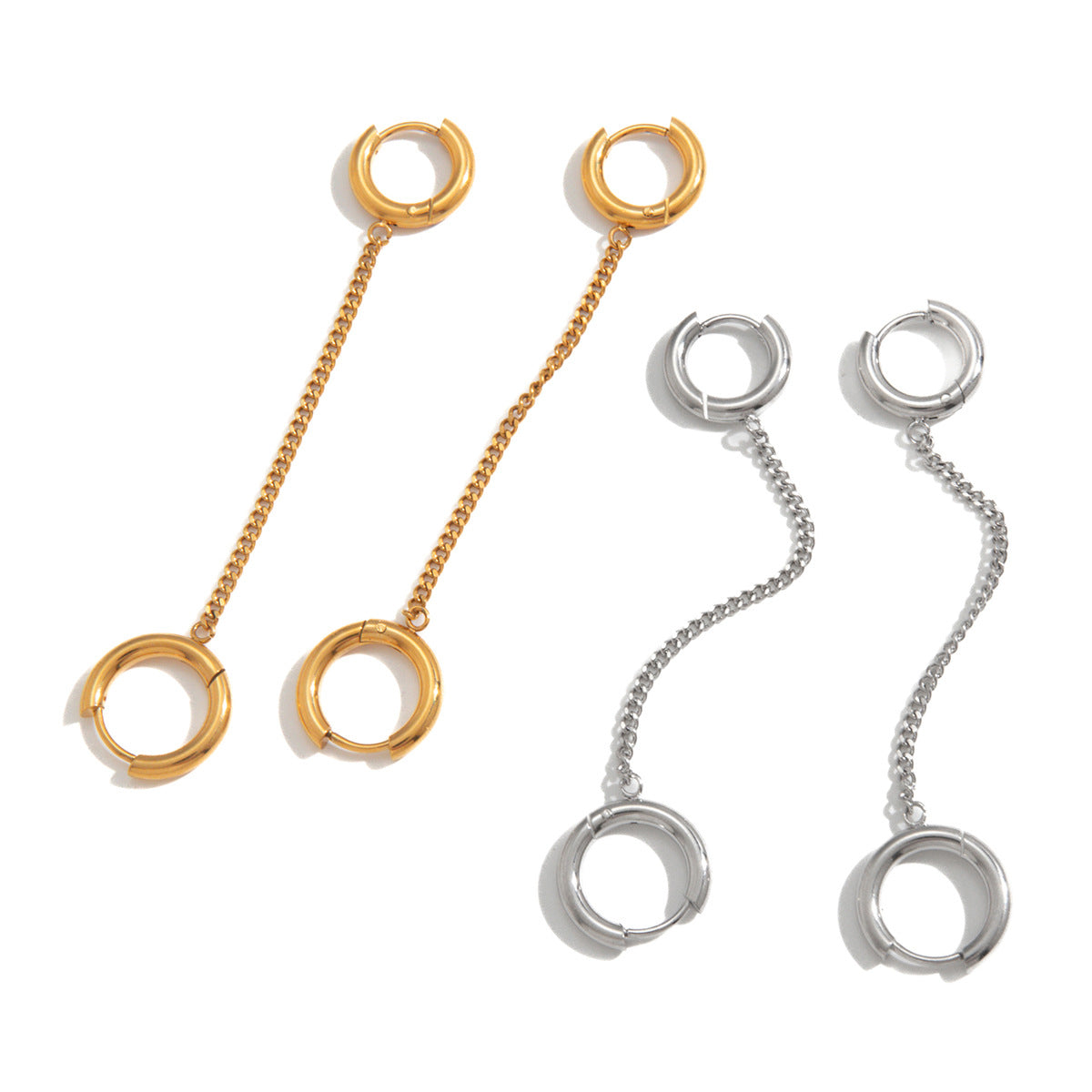 isolated pairs of gold and silver chain connector earrings