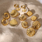 Gold-Tone Stainless Steel Shell and Spiral Stud Earring Collection — front view