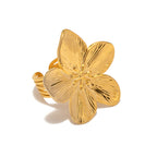 Stainless steel flower open ring isolated on white