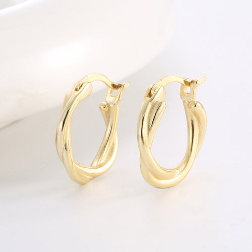 angled pair of sculptural 925 silver double-line hoop earrings