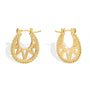 angled pair of textured brass openwork hoop earrings