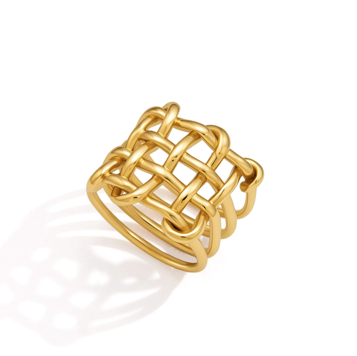 Gold tone ring showing interlaced rounded bars
