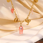 gold plated pink fish and coastal charm necklace