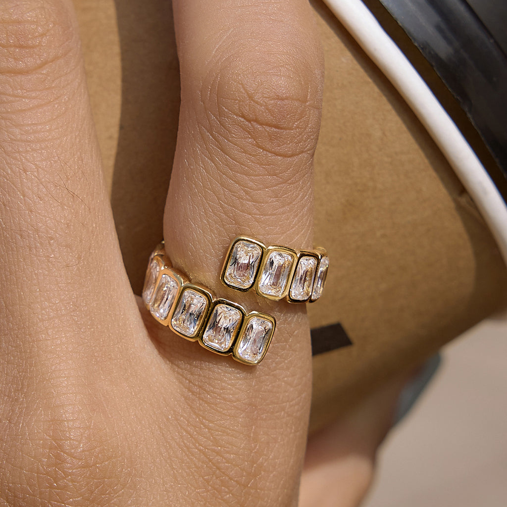 Rectangular zirconia bypass ring worn close-up