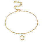isolated gold plated sea turtle charm anklet with extender