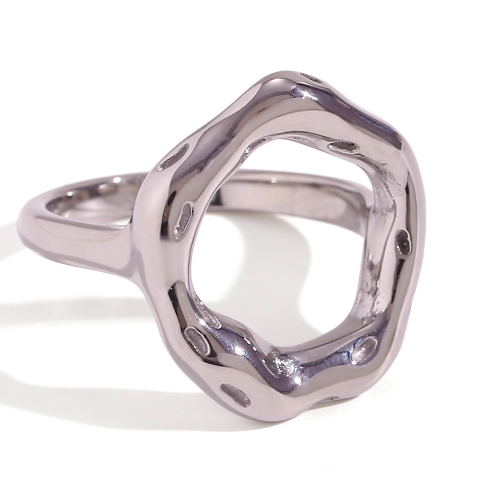 isolated silver-finish stainless steel sculptural open-center ring