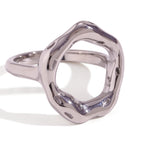 isolated silver-finish stainless steel sculptural open-center ring