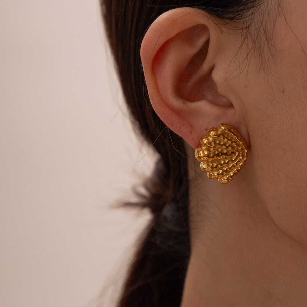 Gold-Tone Stainless Steel Shell and Spiral Stud Earring Collection — detail view