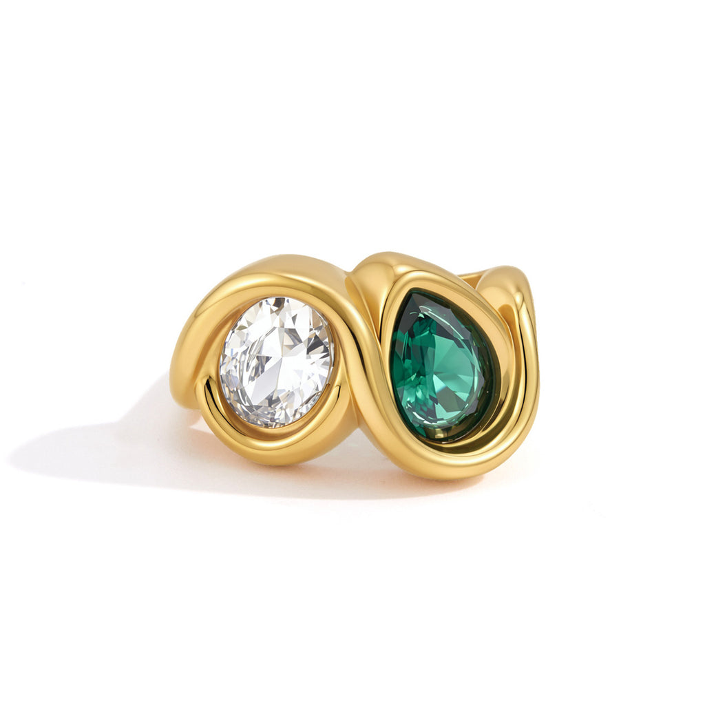 Green pear and clear oval settings on white background