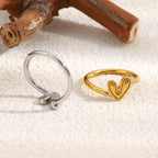 back view of stainless steel heart rings showing smooth bands