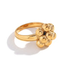 isolated stone-free ring with rounded sculptural cluster