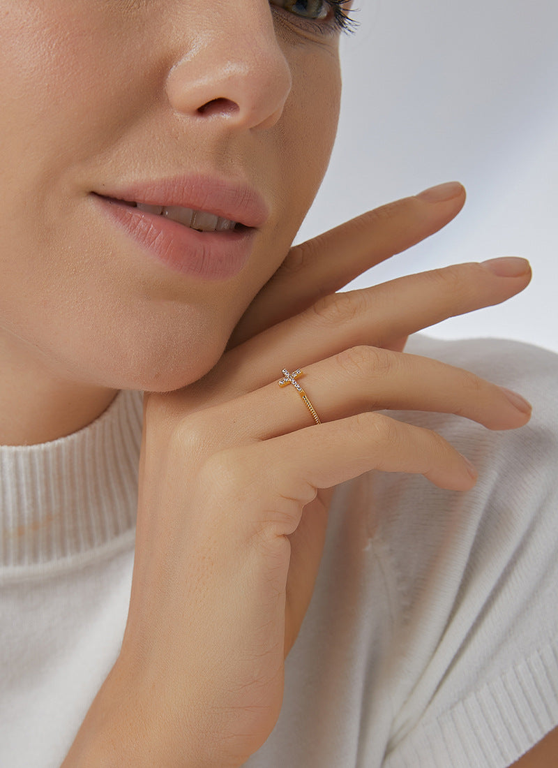 lifestyle view of slim sideways cross ring