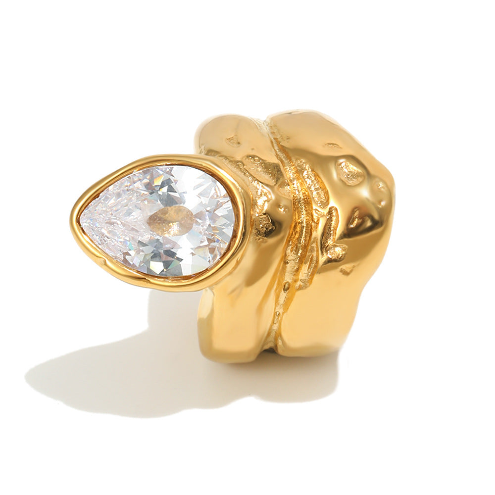close view of gold plated sculptural pear-cut statement ring