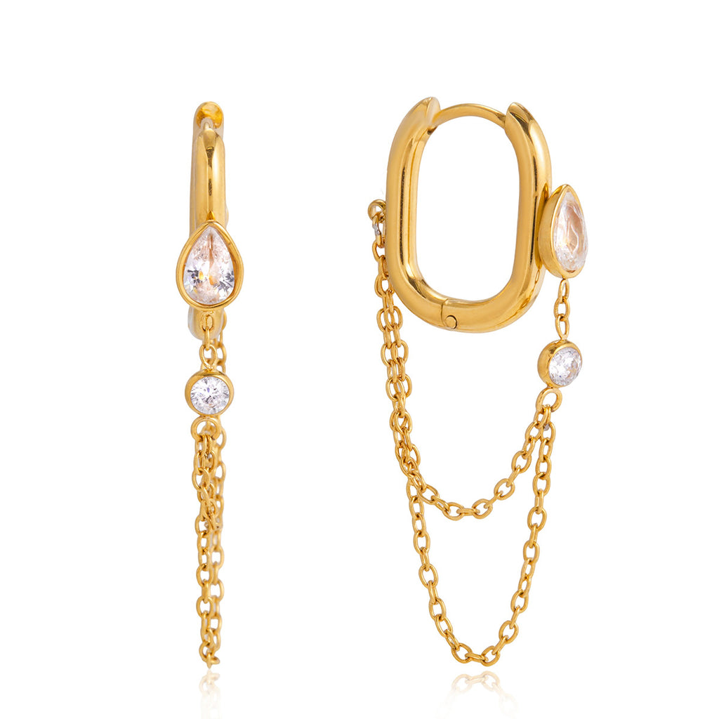 isolated gold plated hoop earrings with clear stone chain accents