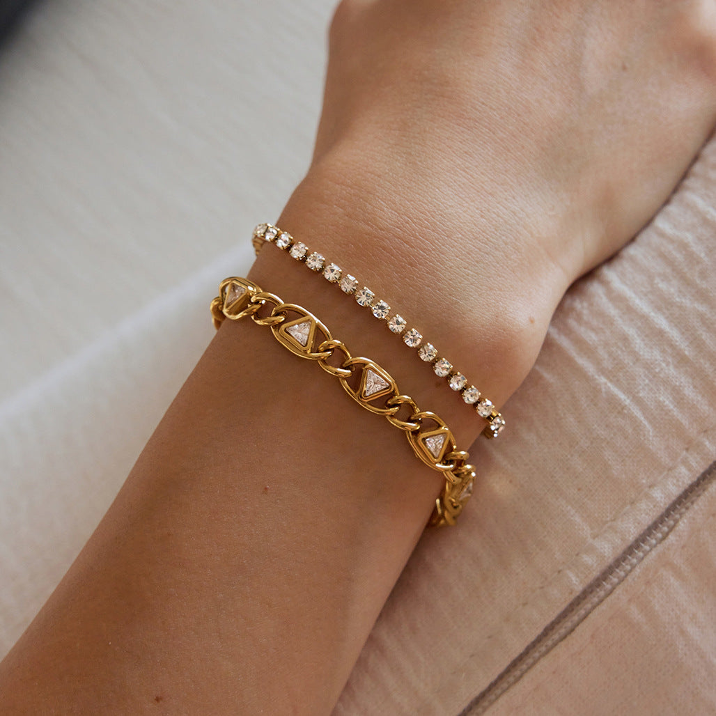 Close-up of triangle zirconia links and a separate tennis bracelet