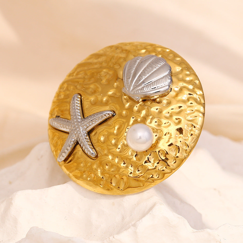 gold plated ocean motif statement ring with pearl and silver accents