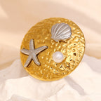 gold plated ocean motif statement ring with pearl and silver accents
