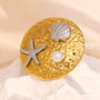 gold plated ocean motif statement ring with pearl and silver accents