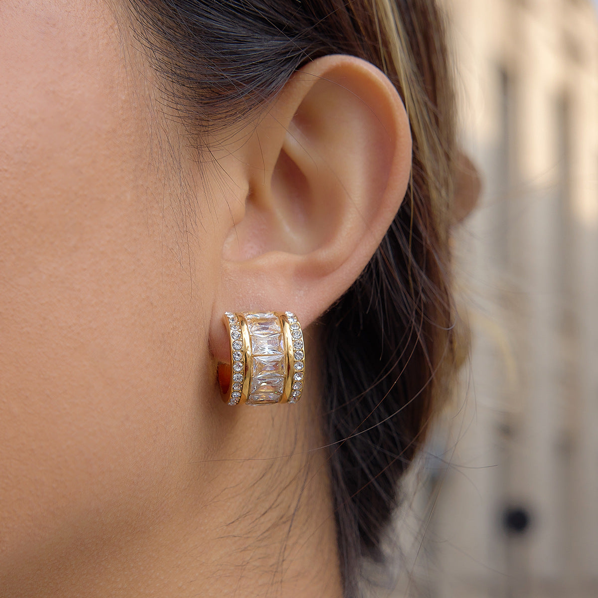 Wide rectangular-stone hoop worn on the ear