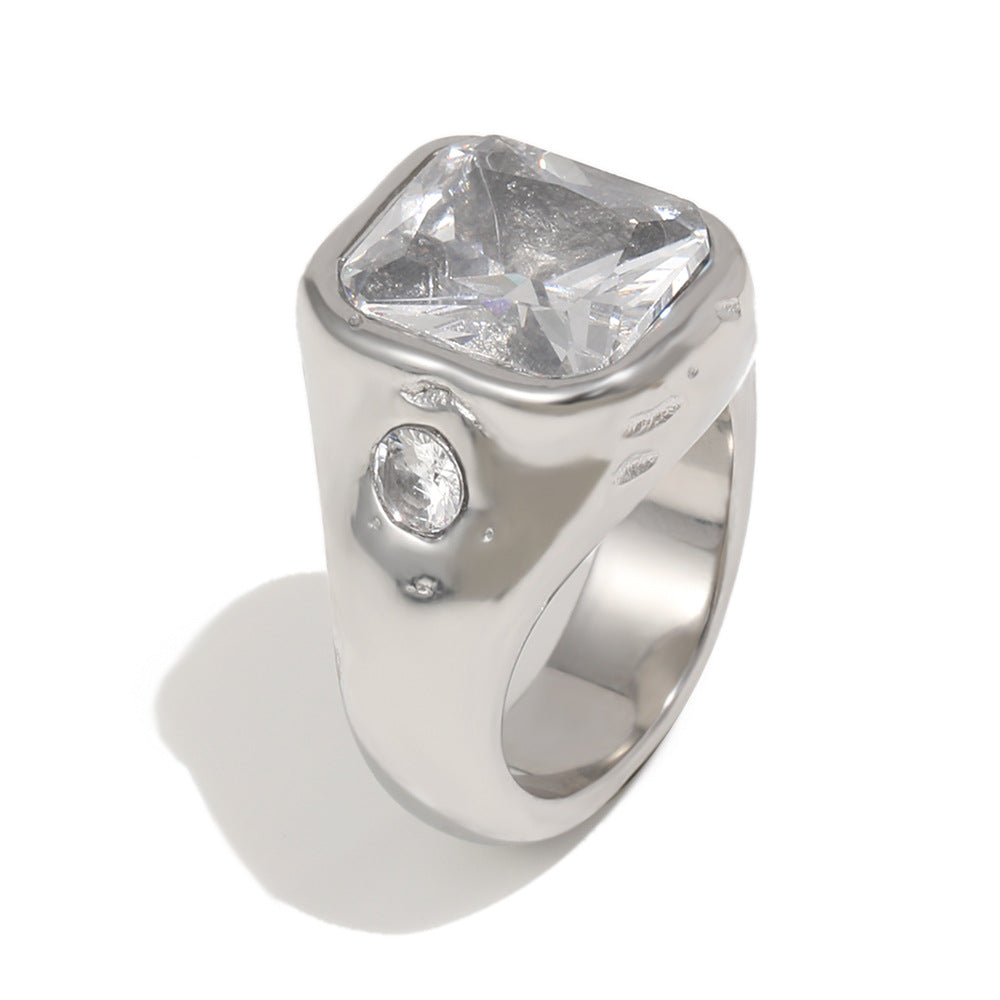 close view of silver-finish clear stone signet ring