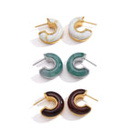 Back and side views of all three resin hoop colors