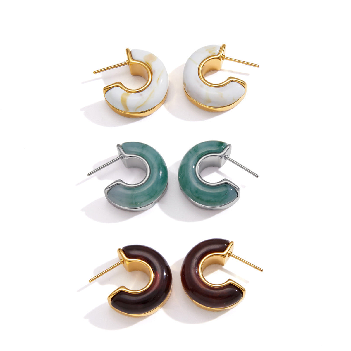 Back and side views of all three resin hoop colors