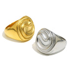 gold plated and silver finish ripple rings shown at angles