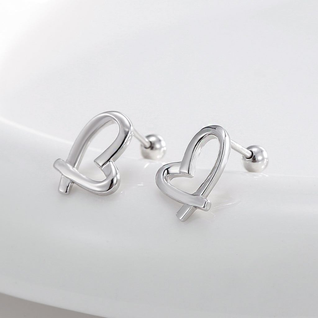pair of open ribbon-heart ball-back earrings in an angled view