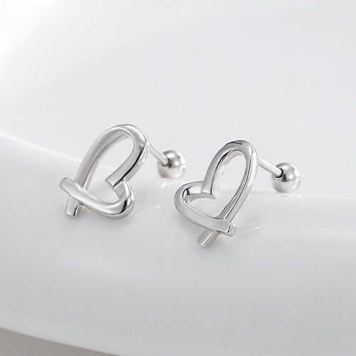 pair of open ribbon-heart ball-back earrings in an angled view